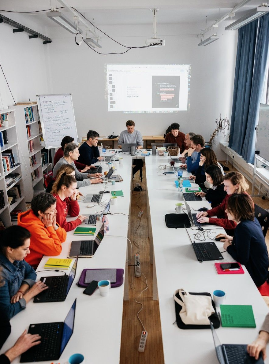 Academy participants working on their projects